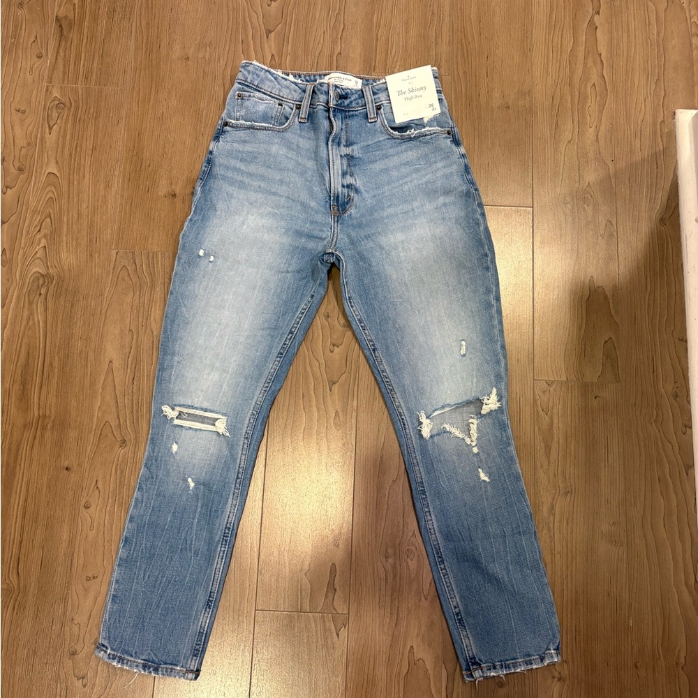 Women's Distressed Blue Jeans